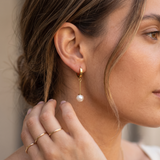 Boucles d’oreilles pendantes en acier inoxydable à perle blanche