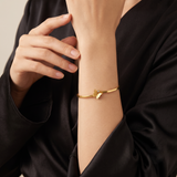 Bracelet jonc doré à motif papillon