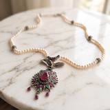 Collier impérial à perles et pendentif aigle