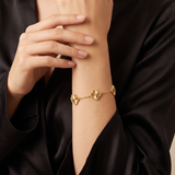 Bracelet doré à motifs trèfle texturés