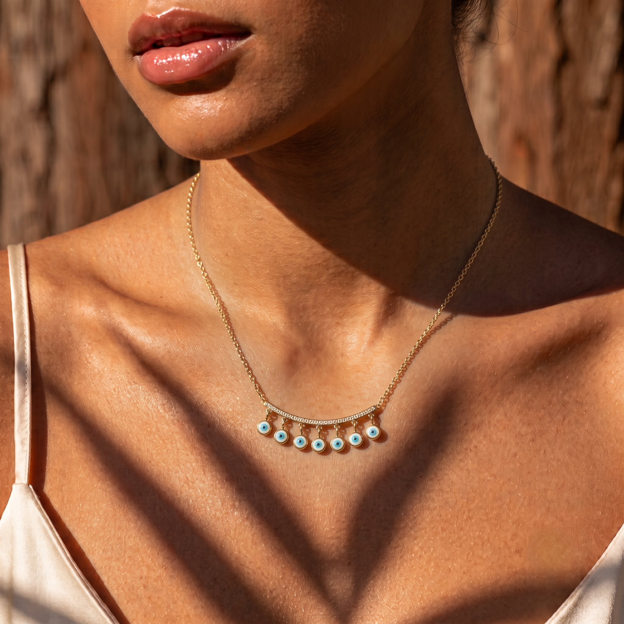 Collier Naïla – Sept yeux bleus et barrette brillante