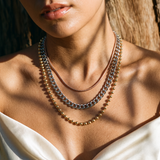 Collier trois rangs à chaîne serpent, maille gourmette et boules