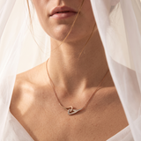 Collier CN Paris en plaqué or à cœurs entrelacés