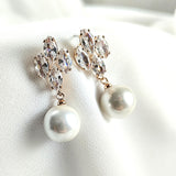 Fashion earrings with pearls and sparkling crystals