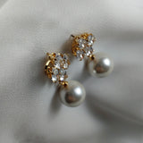 Fashion earrings with pearls and sparkling crystals