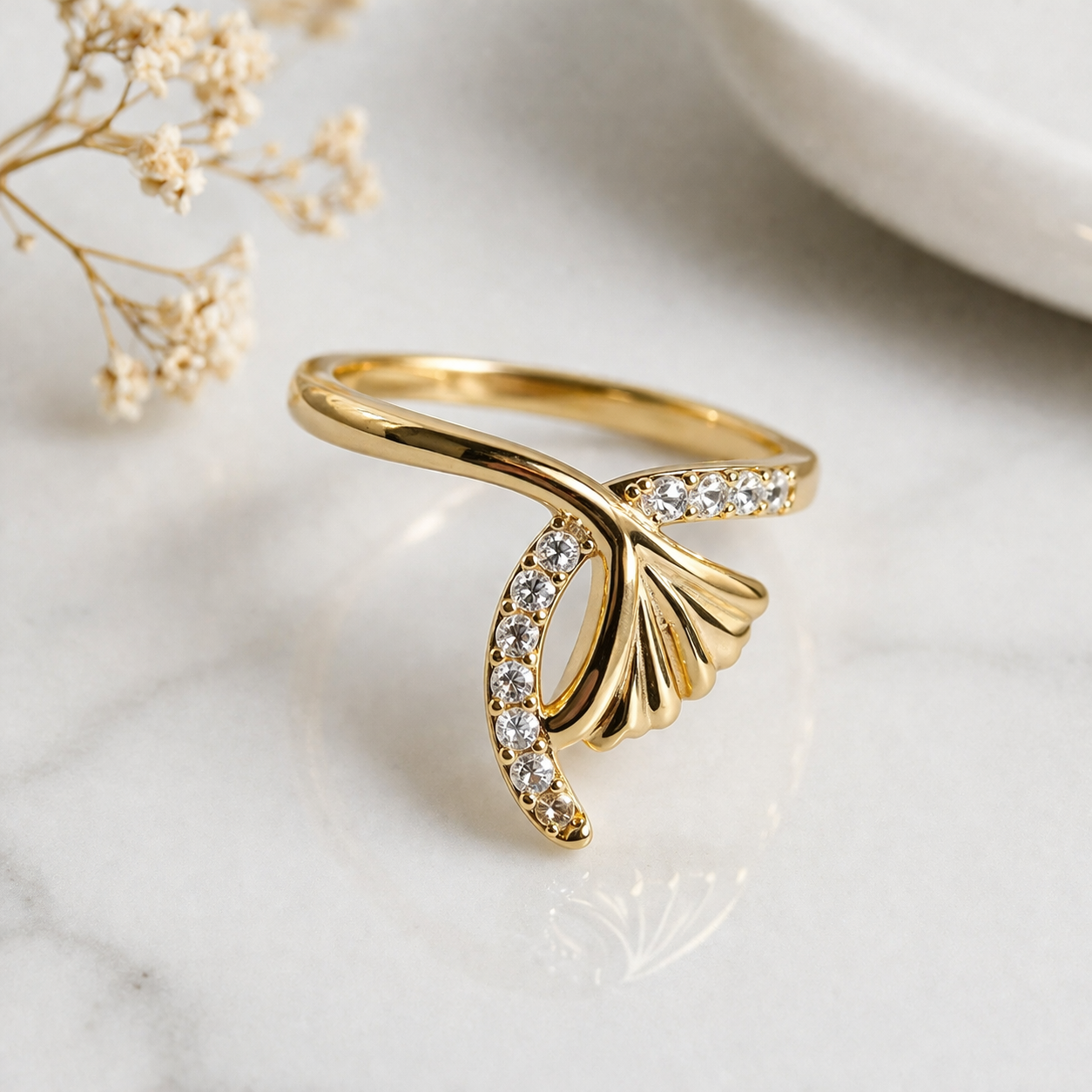 Fine Gold-Plated Ring with Leaf Design and Zircons