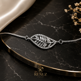 Gourmette Éclat Naturel – Pendentif Feuille Zircons