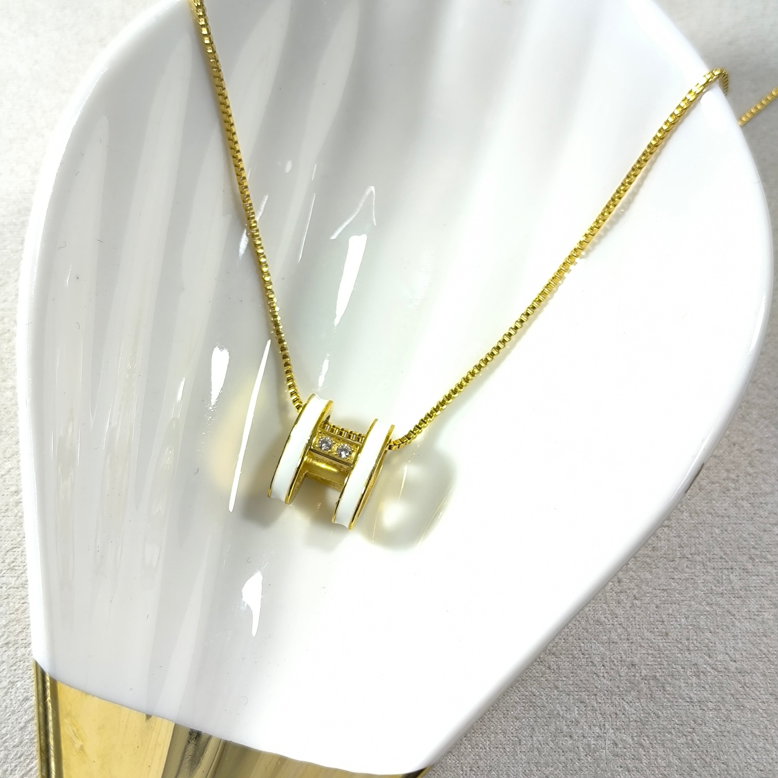 Golden Elegance Necklace – White Enamel & Brilliant Stone Pendant