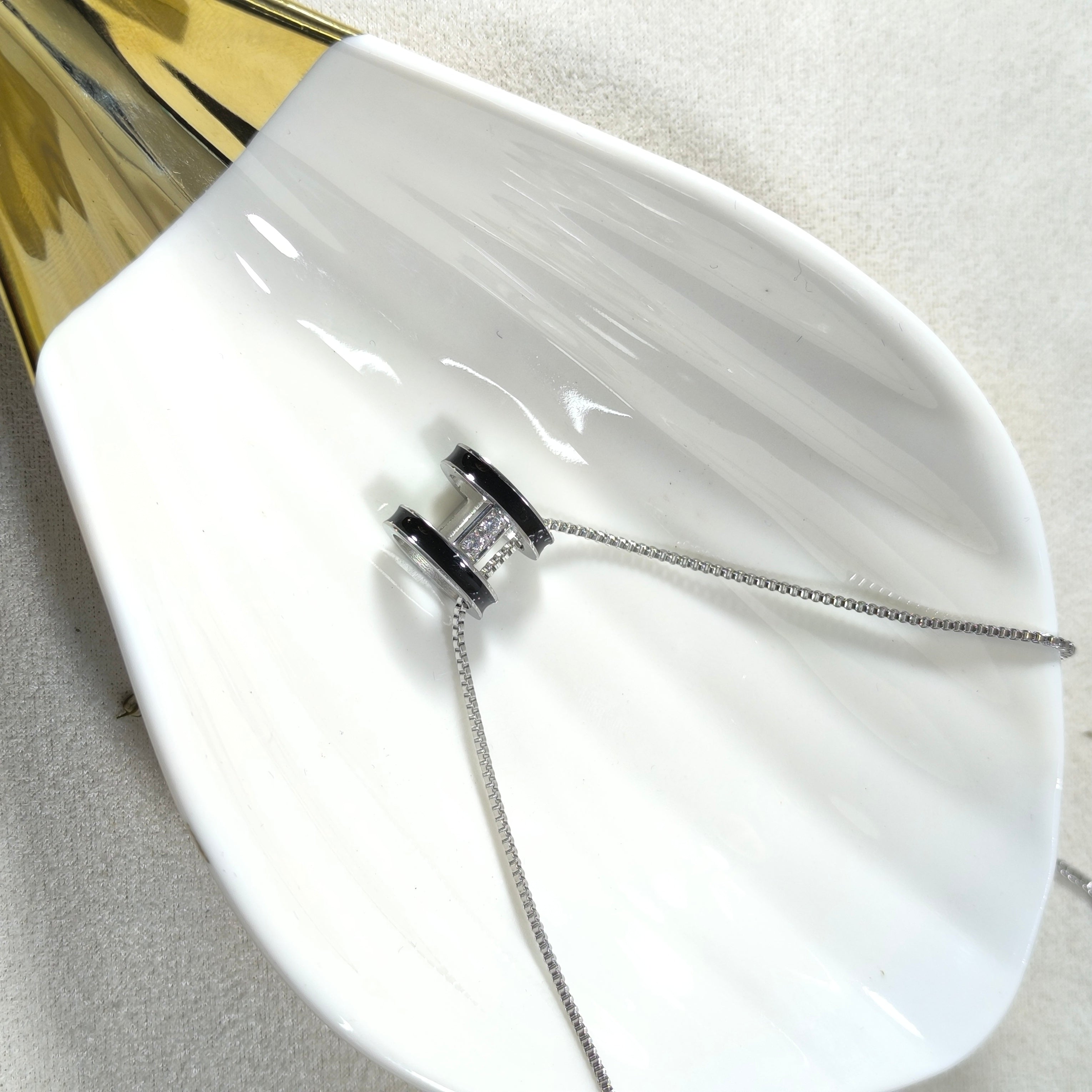 Golden Elegance Necklace – White Enamel & Brilliant Stone Pendant