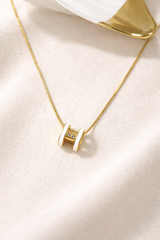 Golden Elegance Necklace – White Enamel & Brilliant Stone Pendant